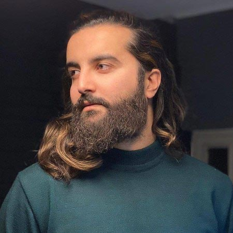 Back angled view with bag open and handles to the side.