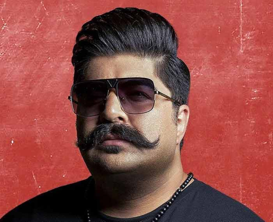 Back angled view with bag open and handles to the side.