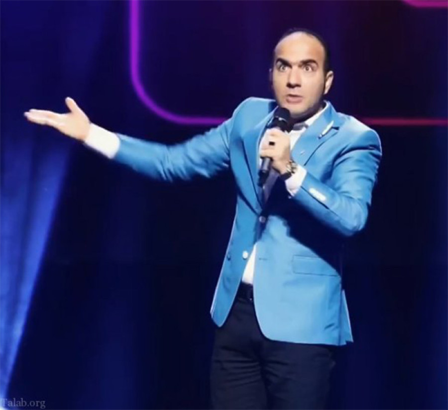 Back angled view with bag open and handles to the side.