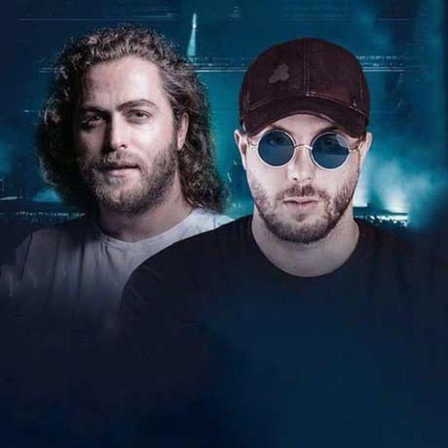 Back angled view with bag open and handles to the side.