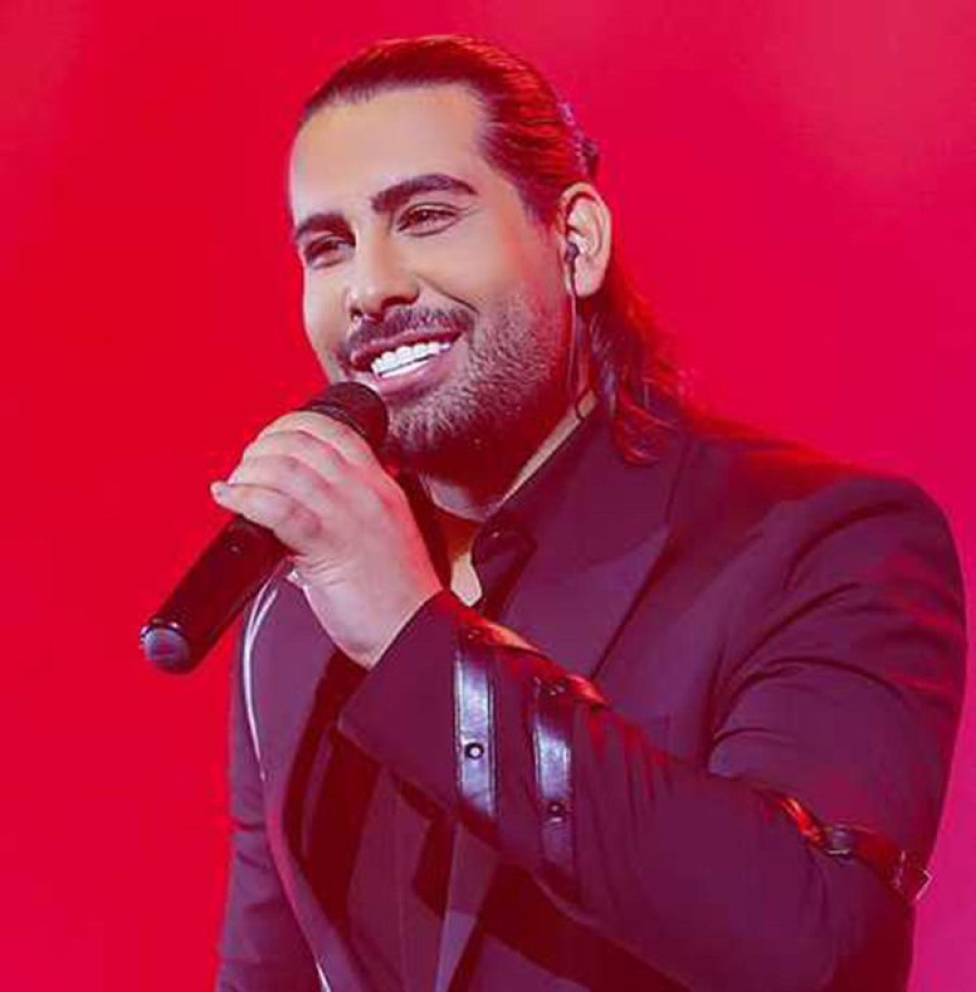 Back angled view with bag open and handles to the side.