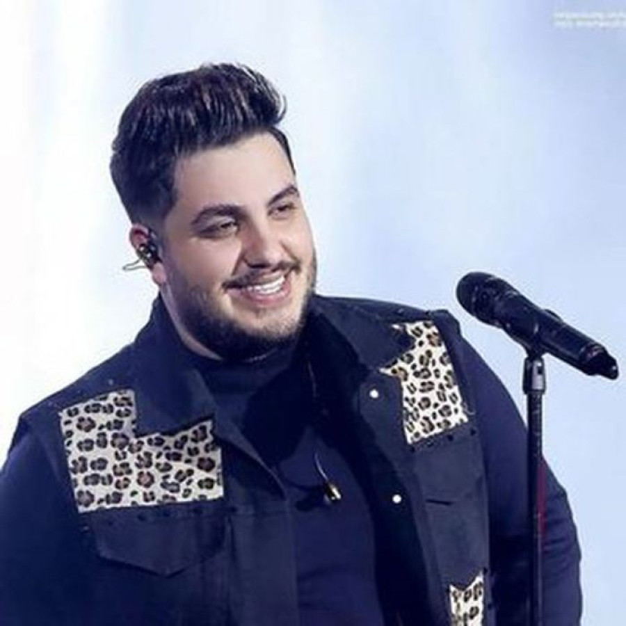 Back angled view with bag open and handles to the side.