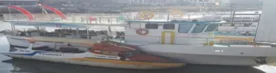 Back angled view with bag open and handles to the side.