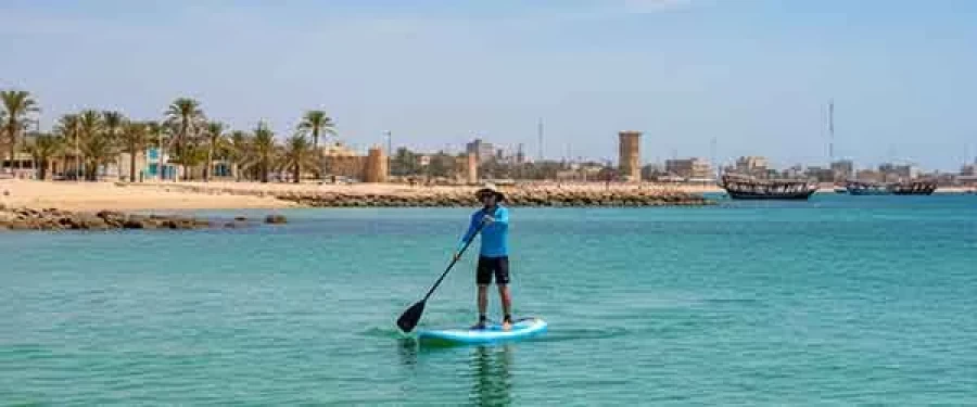 Back angled view with bag open and handles to the side.