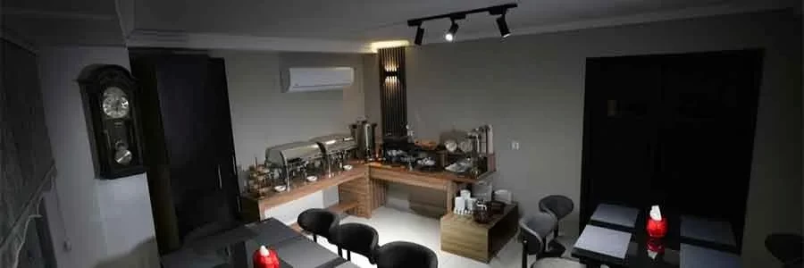 Back angled view with bag open and handles to the side.