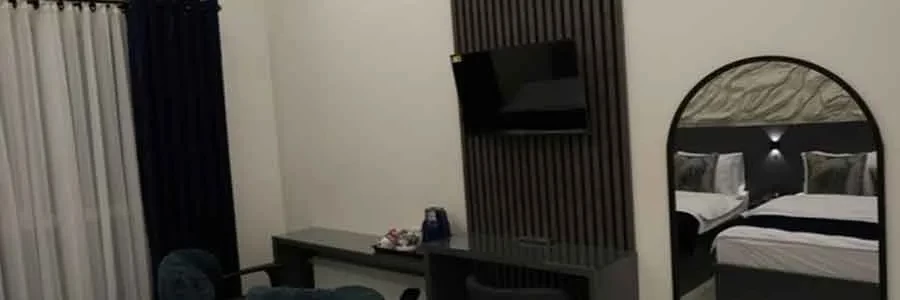 Back angled view with bag open and handles to the side.